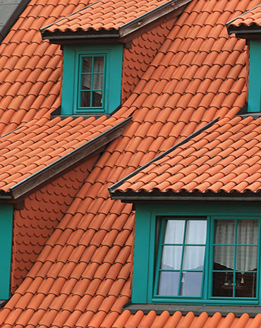 Red roof tiles with dormer windows