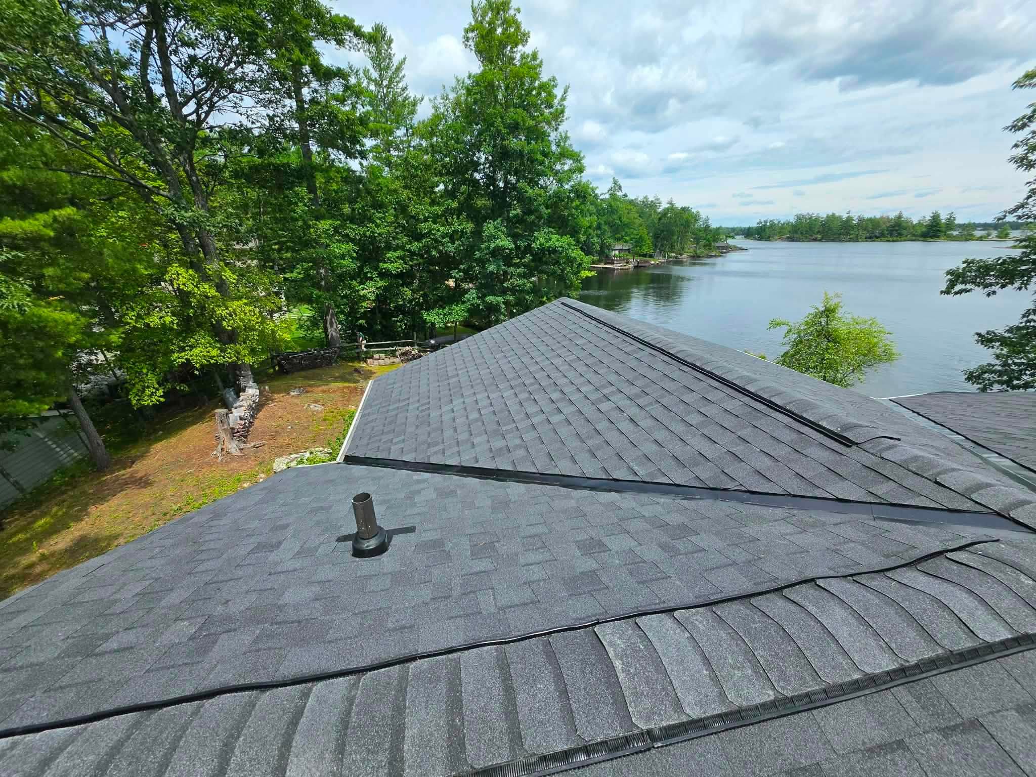 Dark shingle roof overlooking a lake