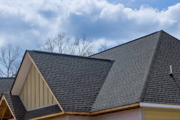 New dark shingle roof on a framed gable